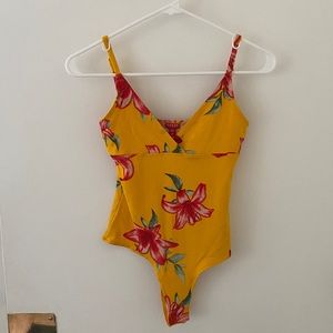 Guess floral bodysuit size xs.